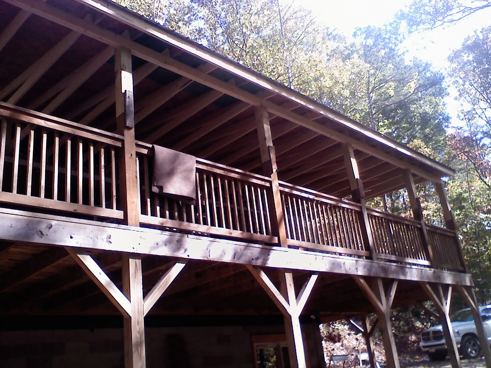 Timber framing under a new elevated porch and deck — Roof Leak Repair in Flat Rock by Roofing Brothers